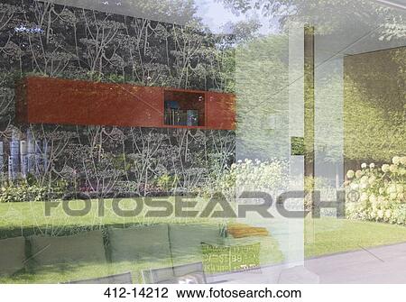 Backyard reflected in windows of modern house View Large Photo Image Stock Image - Backyard reflected in windows of modern house. Fotosearch