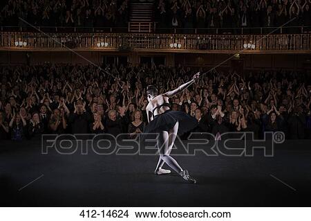 Ballerina bowing on stage in theater View Large Photo Image Picture - Ballerina bowing on stage in theater. Fotosearch