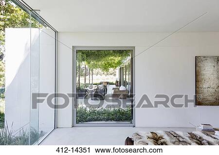 Bedroom window overlooking luxury garden patio View Large Photo Image Stock Image - Bedroom window overlooking luxury garden patio. Fotosearch