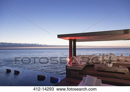 Cabana and infinity pool overlooking ocean View Large Photo Image Stock Image - Cabana and infinity pool overlooking ocean. Fotosearch