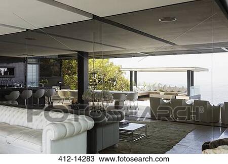 Cabana and modern living room reflected in mirror View Large Photo Image Stock Image - Cabana and modern living room reflected in mirror. Fotosearch