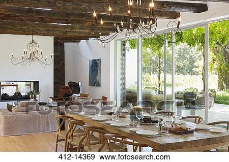 Dining room overlooking patio View Large Photo Image Stock Photo - Dining room overlooking patio. Fotosearch