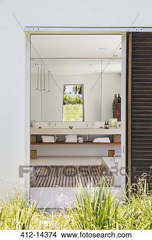 Doorway to modern bathroom View Large Photo Image Picture - Doorway to modern bathroom. Fotosearch