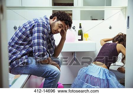 Drunk couple in bathroom at party View Large Photo Image Stock Photograph - Drunk couple in bathroom at party. Fotosearch