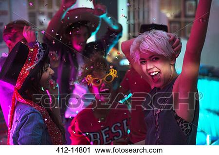 Friends dancing together at party View Large Photo Image Stock Image - Friends dancing together at party. Fotosearch