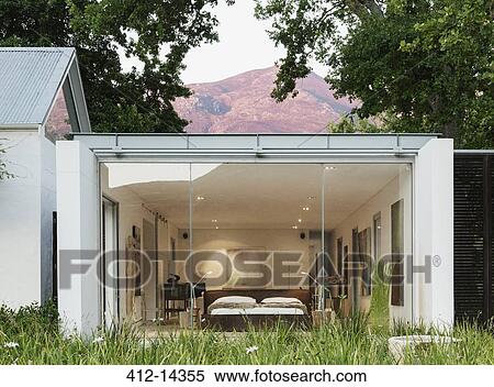 Stock Photography - Glass wall of modern house. Fotosearch