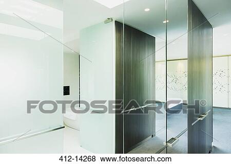 Glass walls in modern house View Large Photo Image Stock Photo - Glass walls in modern house. Fotosearch