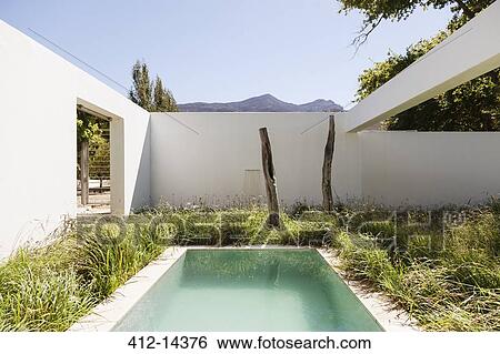 Grass surrounding lap pool View Large Photo Image Stock Photograph - Grass surrounding lap pool. Fotosearch