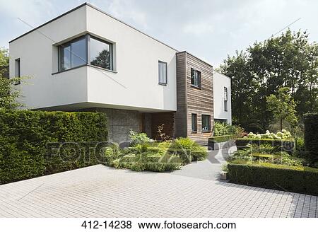Hedges around modern house View Large Photo Image Stock Photo - Hedges around modern house. Fotosearch