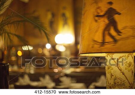 Illustrated dancers on lampshade in restaurant View Large Photo Image Stock Image - Illustrated dancers on lampshade in restaurant. Fotosearch