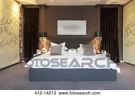 Lamps and wall art in modern bedroom View Large Photo Image Stock Image - Lamps and wall art in modern bedroom. Fotosearch