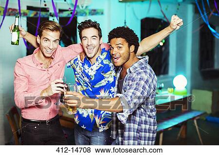 Men toasting each other at party View Large Photo Image Stock Photo - Men toasting each other at party. Fotosearch