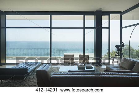Stock Image - Modern house overlooking ocean. Fotosearch