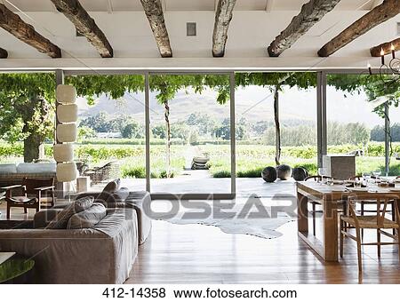 Open floor plan in luxury house overlooking vineyard View Large Photo Image Stock Photo - Open floor plan in luxury house overlooking vineyard. Fotosearch