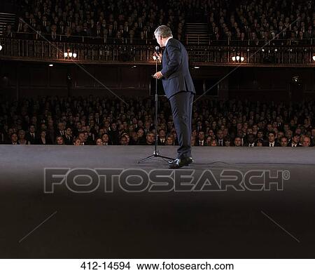 Picture - Performer on stage in theater. Fotosearch