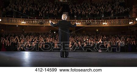 Performer on stage in theater View Large Photo Image Stock Photo - Performer on stage in theater. Fotosearch
