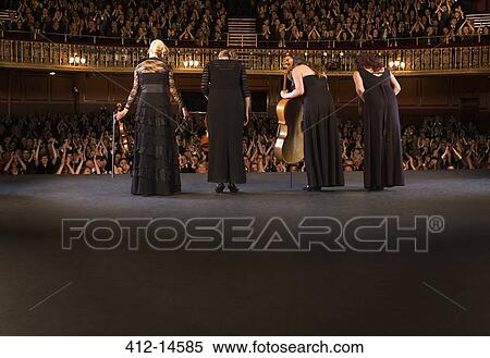 Quartet bowing on stage in theater View Large Photo Image Stock Photography - Quartet bowing on stage in theater. Fotosearch