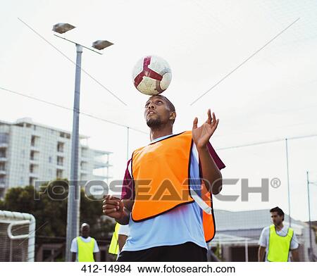 Soccer player training on field View Large Photo Image Picture - Soccer player training on field. Fotosearch