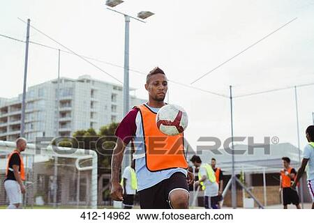 Soccer player training on field View Large Photo Image Stock Image - Soccer player training on field. Fotosearch
