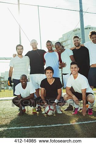 Soccer players smiling on field View Large Photo Image Stock Photography - Soccer players smiling on field. Fotosearch