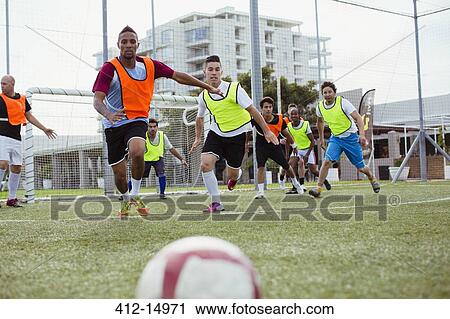 Soccer players training on field View Large Photo Image Stock Image - Soccer players training on field. Fotosearch