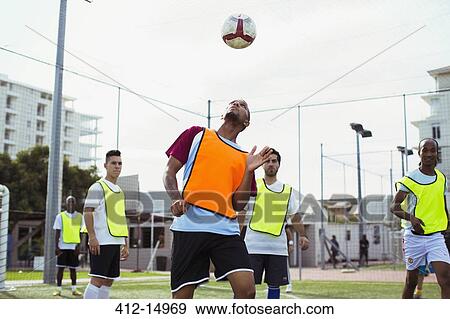 Soccer players training on field View Large Photo Image Stock Photo - Soccer players training on field. Fotosearch