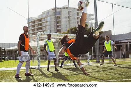Soccer players training on field View Large Photo Image Stock Photo - Soccer players training on field. Fotosearch