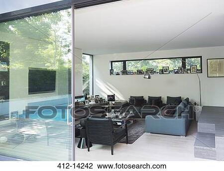 Sofas and armchairs in modern living room View Large Photo Image Stock Image - Sofas and armchairs in modern living room. Fotosearch
