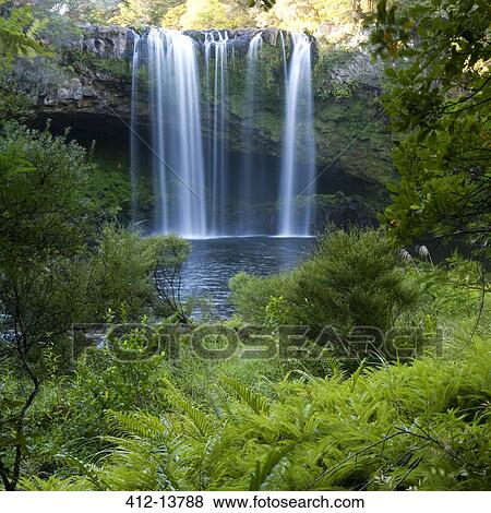 Tranquil waterfall View Large Photo Image Stock Photo - Tranquil waterfall. Fotosearch