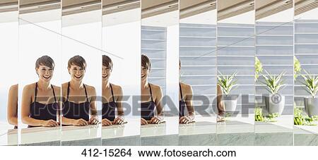 Woman laughing in split mirror View Large Photo Image Picture - Woman laughing in split mirror. Fotosearch