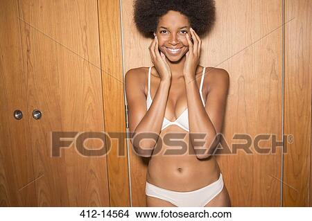 Woman wearing bra and panties View Large Photo Image Picture - Woman wearing bra and panties. Fotosearch
