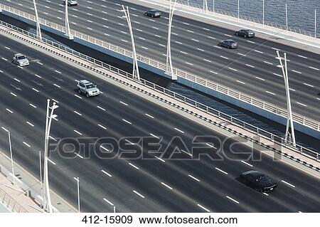 Cars on freeway bridge View Large Photo Image Stock Photo - Cars on freeway bridge. Fotosearch