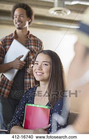 Casual business people in meeting View Large Photo Image Stock Image - Casual business people in meeting. Fotosearch