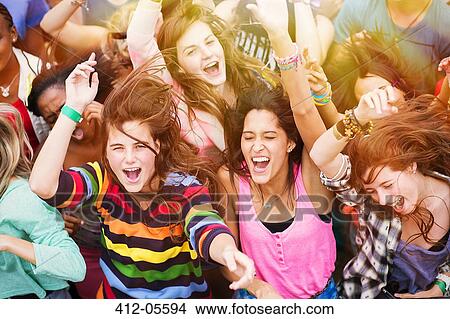 Cheering fans at music festival View Large Photo Image Picture - Cheering fans at music festival. Fotosearch