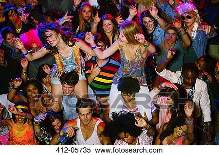 Cheering women on men's shoulders at music festival View Large Photo Image Stock Photography - Cheering women on men's shoulders at music festival. Fotosearch
