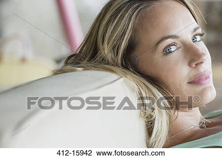 Stock Image - Close up portrait of confident woman. Fotosearch