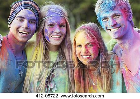 Close up portrait of friends covered in chalk dye at music festival View Large Photo Image Stock Image - Close up portrait of friends covered in chalk dye at music festival. Fotosearch
