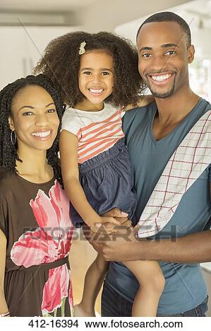 Close up portrait of smiling family View Large Photo Image Picture - Close up portrait of smiling family. Fotosearch