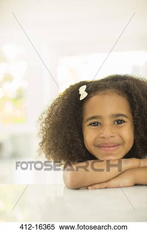 Stock Photography - Close up portrait of smiling girl. Fotosearch