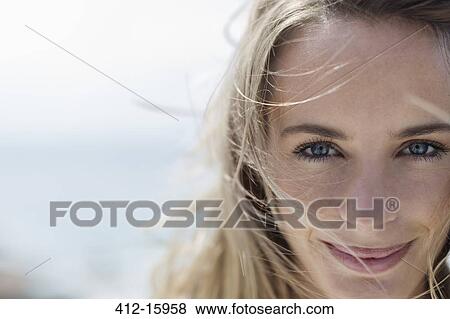 Stock Photo - Close up portrait of smiling woman. Fotosearch
