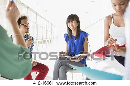 Creative business people meeting in circle of chairs View Large Photo Image Stock Image - Creative business people meeting in circle of chairs. Fotosearch