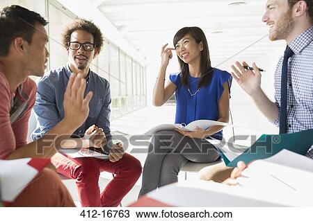 Creative business people meeting in circle of chairs View Large Photo Image Stock Image - Creative business people meeting in circle of chairs. Fotosearch