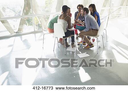 Creative business people meeting in circle of chairs View Large Photo Image Stock Image - Creative business people meeting in circle of chairs. Fotosearch