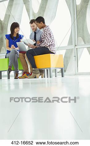 Creative business people meeting on stools View Large Photo Image Stock Image - Creative business people meeting on stools. Fotosearch