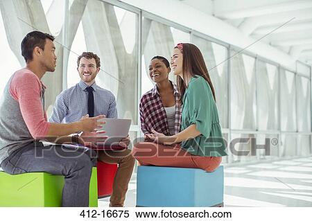 Creative business people meeting on colorful stools View Large Photo Image Stock Photography - Creative business people meeting on colorful stools. Fotosearch