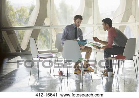 Creative businessmen brainstorming in circle of chairs View Large Photo Image Stock Image - Creative businessmen brainstorming in circle of chairs. Fotosearch