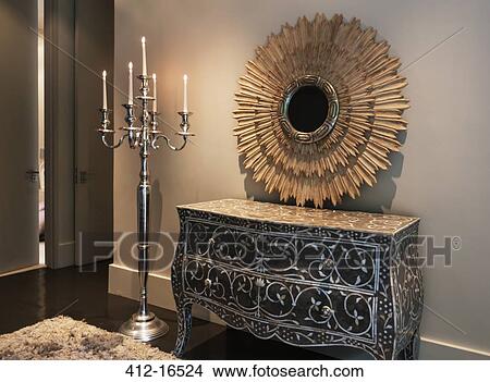 Picture - Elegant dresser, mirror and candelabra in luxury bedroom. Fotosearch