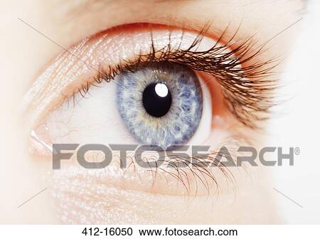 Stock Image - Extreme close up of blue eye. Fotosearch