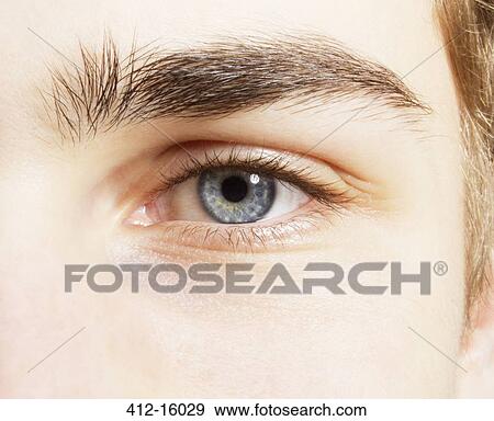 Extreme close up of blue eye View Large Photo Image Stock Photo - Extreme close up of blue eye. Fotosearch