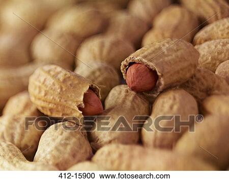 Stock Image - Extreme close up of peanuts in shell. Fotosearch